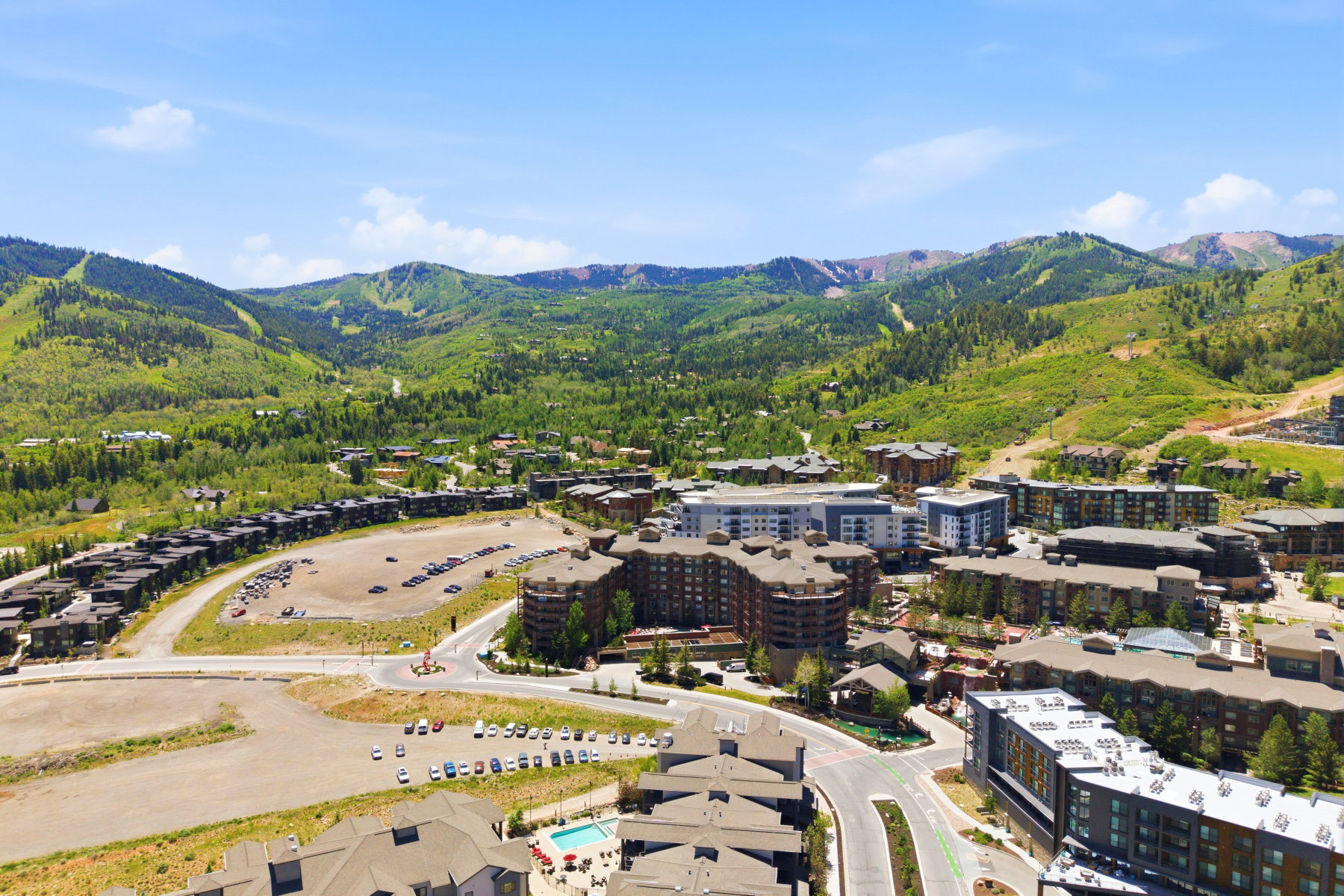 Expansive mountainous landscape providing a backdrop for a modern residential community