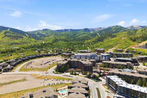 Expansive mountainous landscape providing a backdrop for a modern residential community