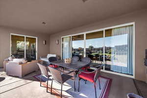 View of patio / terrace featuring outdoor dining space and an outdoor living space