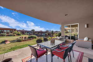 View of patio with outdoor dining space