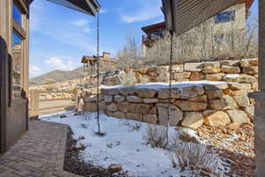 View of yard featuring a mountain view and a patio area