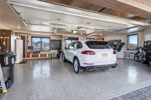 Garage with freestanding refrigerator