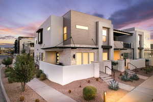 End unit with front patio and grill