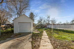 Detached garage featuring driveway