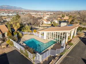 View of pool featuring a residential view, a mountain view, and a patio