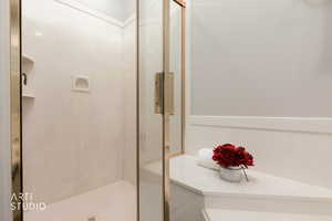 Full bathroom featuring a marble finish shower