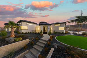 View of front of home with a standing seam roof and a metal roof