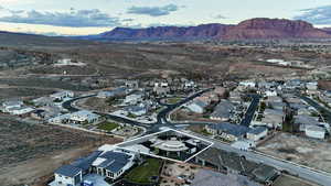 Aerial view of residential area featuring a mountain backdrop