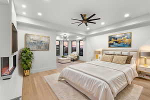 Bedroom featuring light wood-style flooring, recessed lighting, and ceiling fan