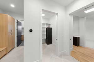 Hall featuring baseboards