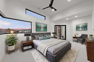 Bedroom with ceiling fan and recessed lighting
