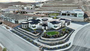 Aerial perspective of suburban area featuring a mountainous background