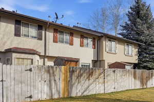 View of property exterior with stucco siding