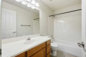 Full bath featuring vanity and tub / shower combination