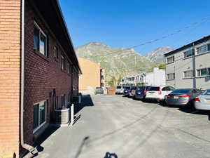 Uncovered parking lot with a mountain view and a residential view