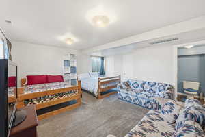 Bedroom with carpet flooring