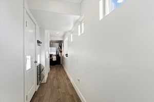 ENTRY Hall with wood tiled floors and recessed lighting