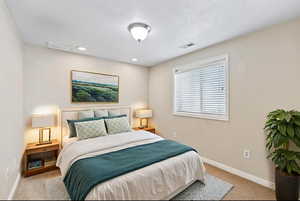 Bedroom featuring carpet flooring and recessed lighting