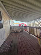 Wooden deck with a storage shed