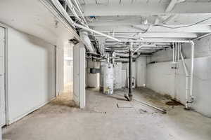 Unfinished basement with gas water heater