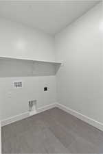 Laundry room with washer hookup and hookup for an electric dryer