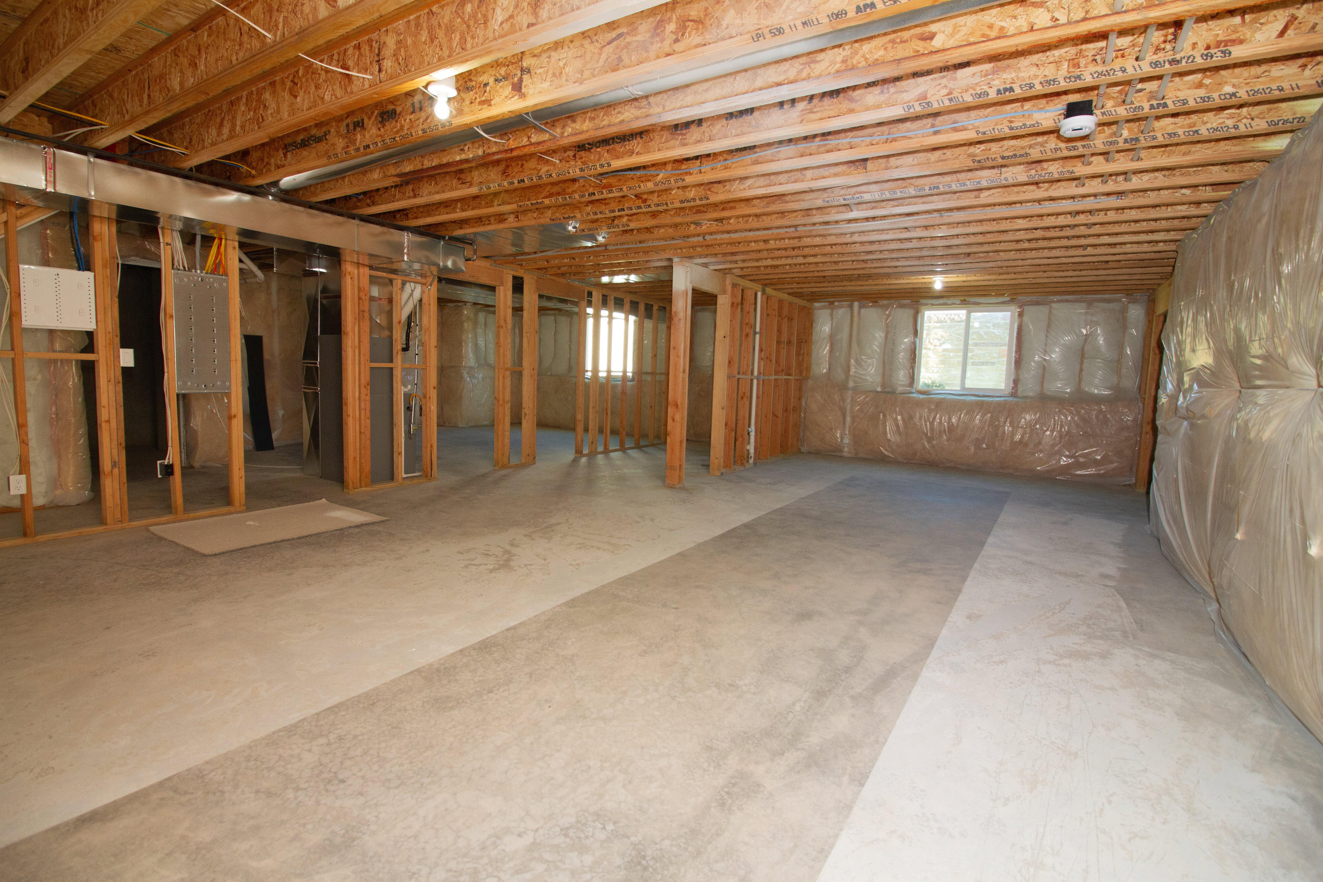 Spacious unfinished basement. Partially framed.