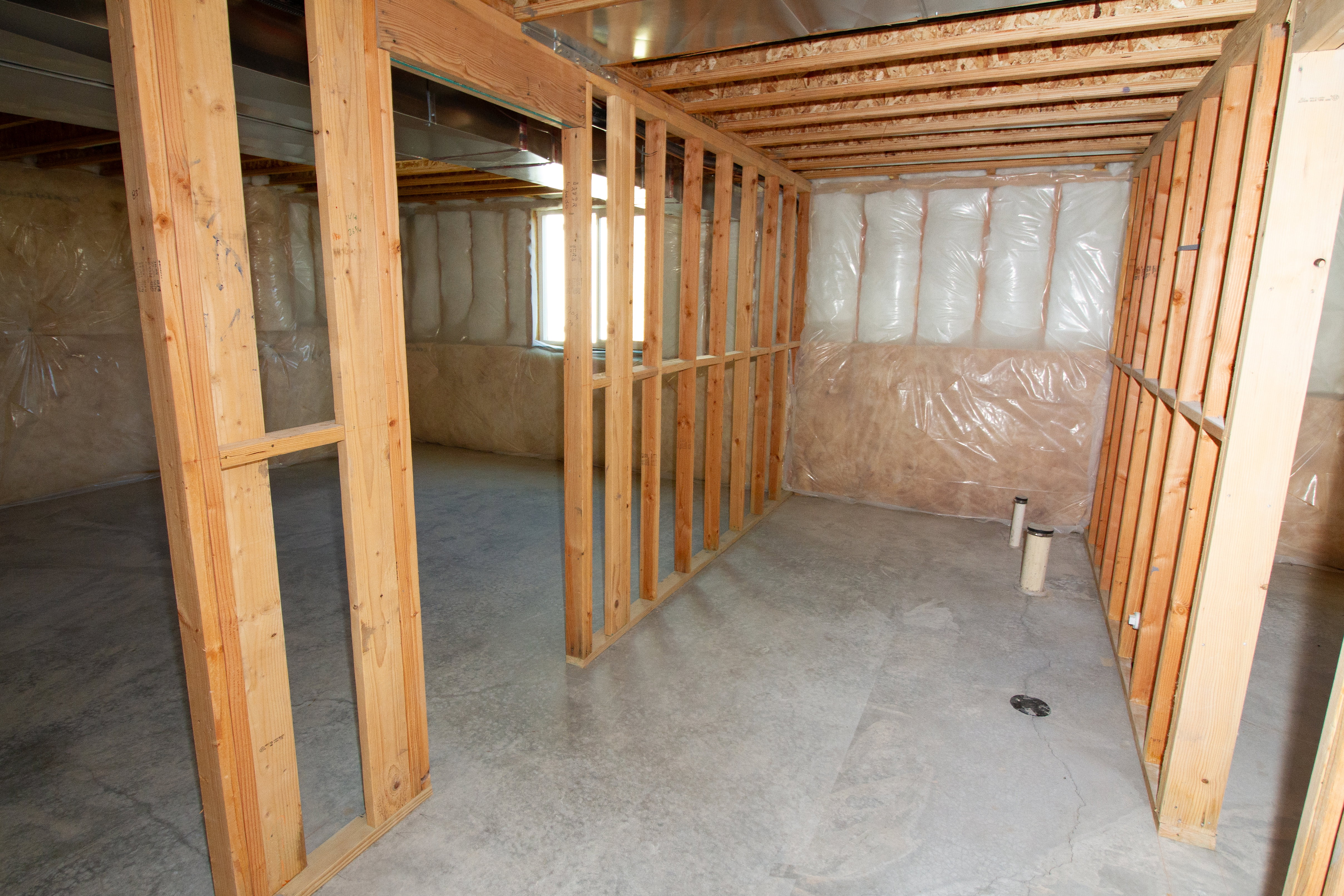 Spacious unfinished basement. Partially framed.