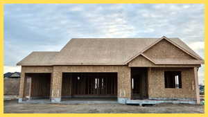 Property in mid-construction with a porch