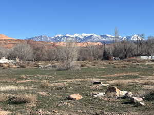 View of mountain background featuring rural landscape