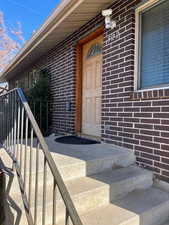 View of beautiful front door and brick exterior in wonderful shape