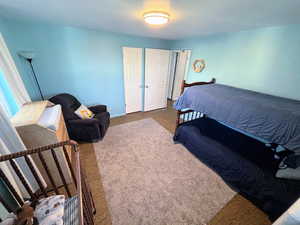 Spacious bedroom on main level with extra wide doorway