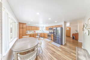 Kitchen with plenty of countertop space and lighting