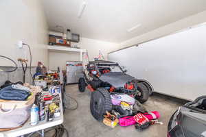 Garage featuring a heating unit