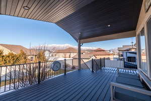 Wooden deck featuring a residential view