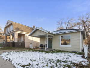 Bungalow-style home with a patio