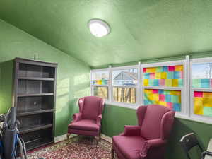 Sunroom / solarium with vaulted ceiling