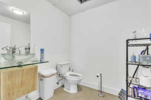 Half bath with toilet and vanity