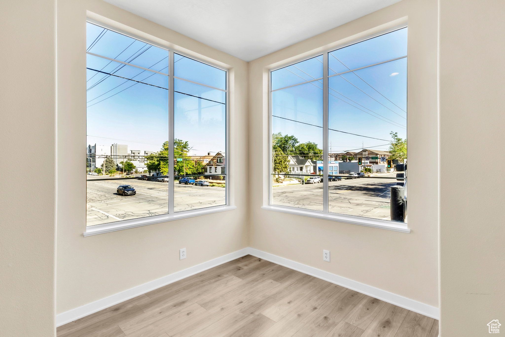 Empty room featuring light wood-style floors and baseboards