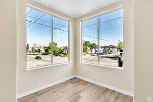 Empty room featuring light wood-style floors and baseboards