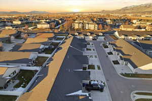 Aerial view of residential area featuring a mountain backdrop