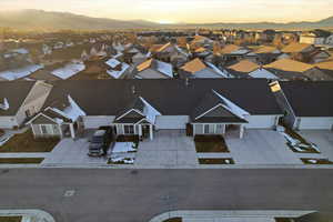 Aerial view at dusk of a mountain view and a residential view