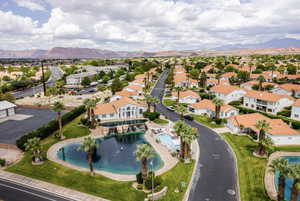 Aerial perspective of suburban area with a water and mountain view