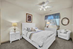 Bedroom with carpet floors and ceiling fan