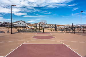 View of basketball court with community basketball court and a residential view