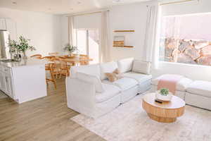 Living room featuring light wood-style flooring
