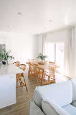 Living area with light wood finished floors