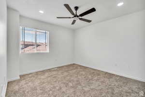 Unfurnished room with light colored carpet, recessed lighting, and ceiling fan