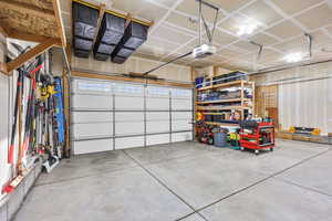 Garage featuring a garage door opener