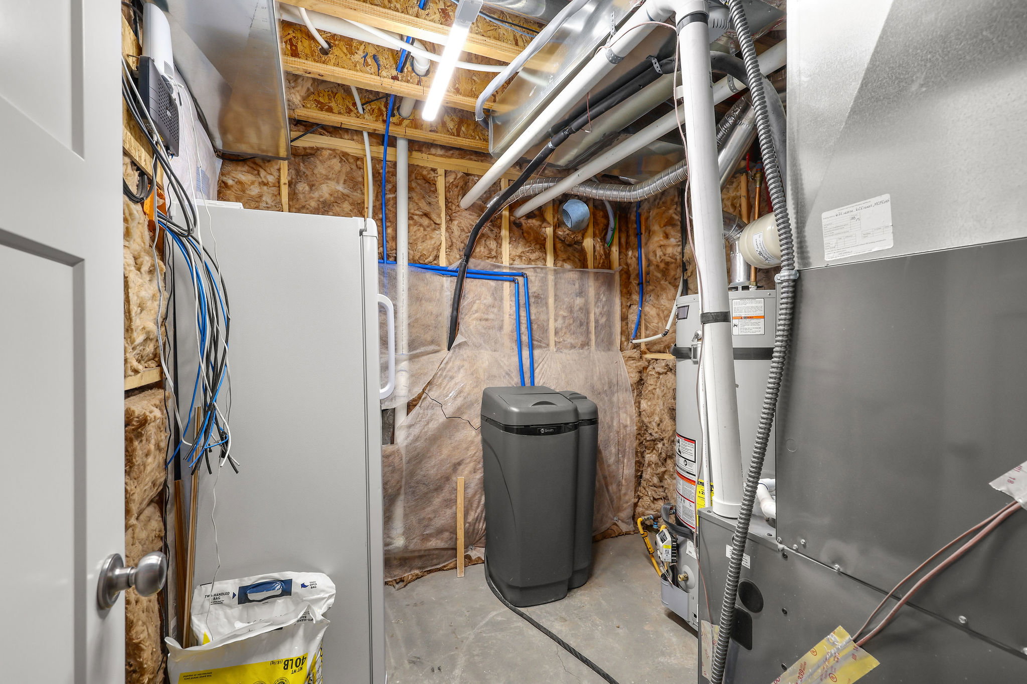 Utilities with heating unit and water heater