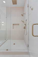 Bathroom featuring a shower stall